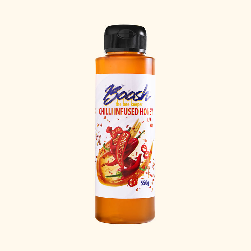 Squeezable bottle of Egyptian chilli-infused honey from Boosh the Beekeeper, 550g, front view
