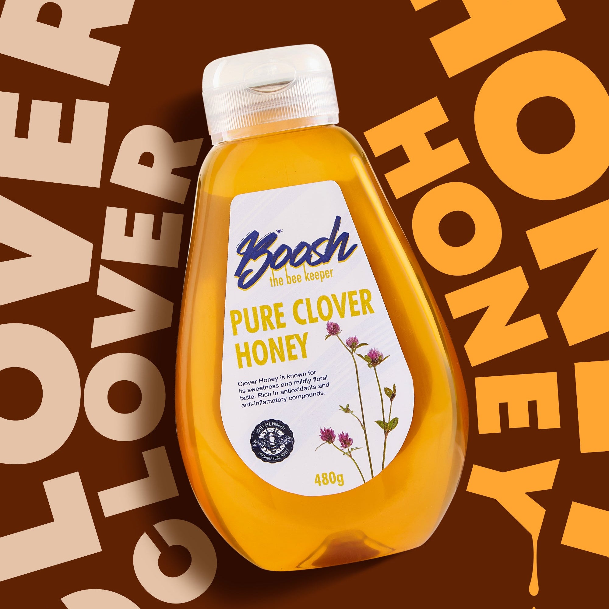 Squeezable bottle of Egyptian clover honey from Boosh the Beekeeper, 480g, side view