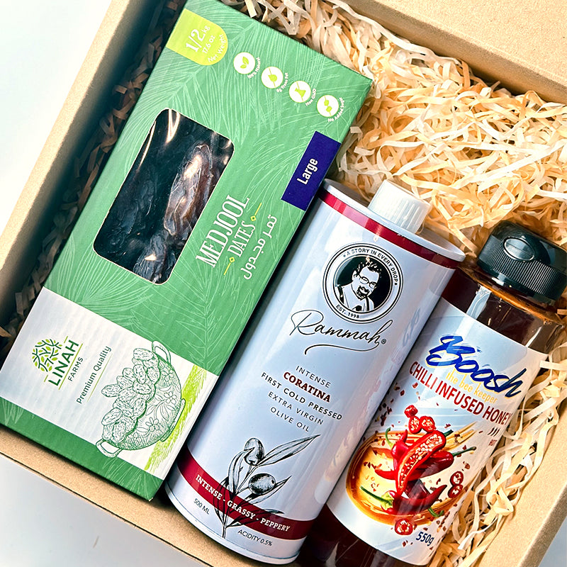 Egyptian gift bundle — Linah Farms Medjool dates, Boosh the Beekeeper chilli honey, and Rammah Farms Coratina olive oil.