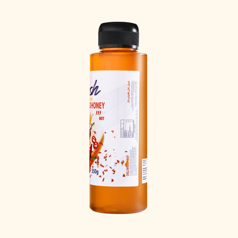 Squeezable bottle of Egyptian chilli-infused honey from Boosh the Beekeeper, 550g, back label with ingredient information