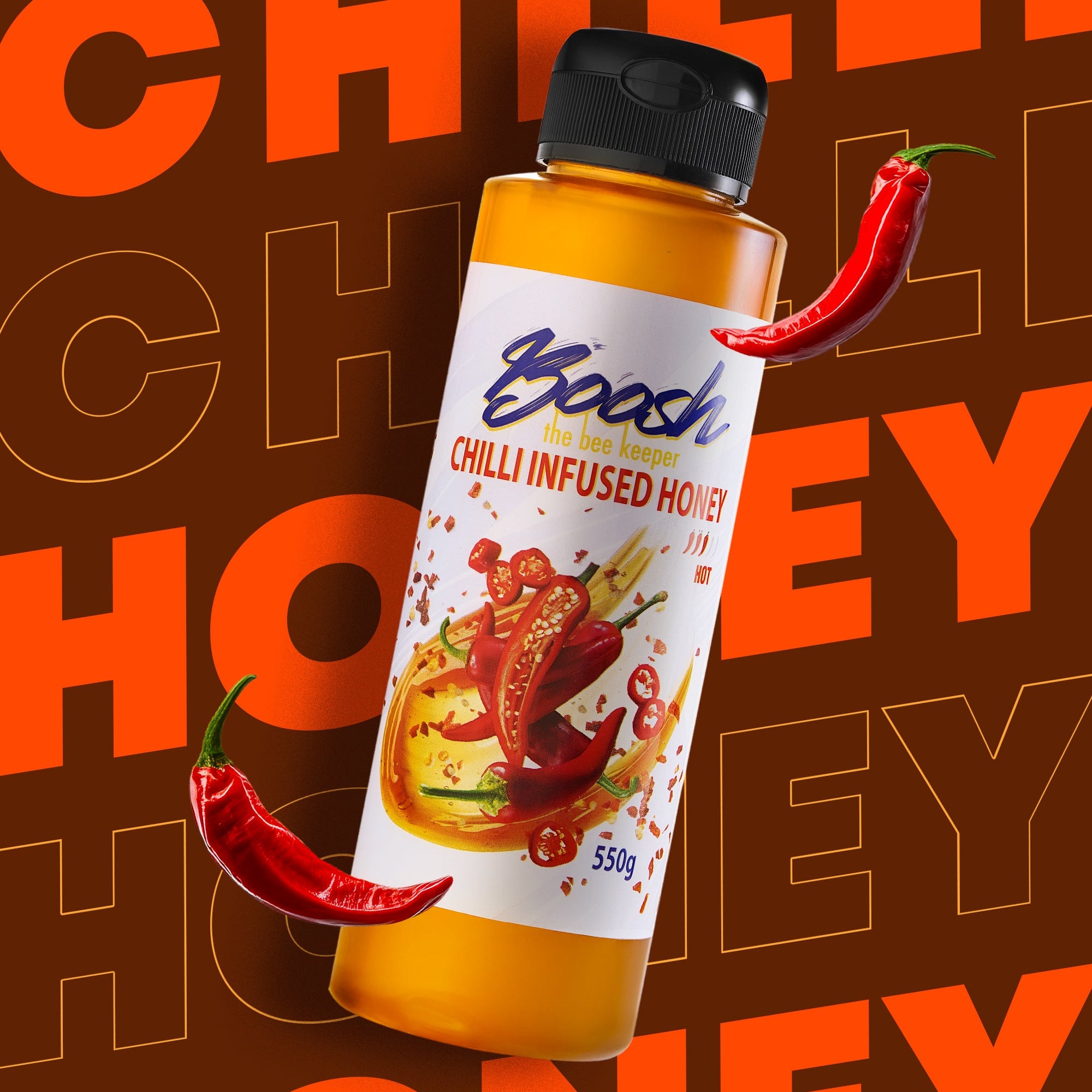 Squeezable bottle of Egyptian chilli-infused honey from Boosh the Beekeeper, 550g, side view